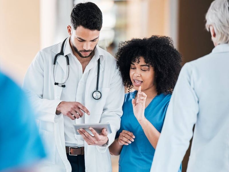 medical-professionals-discussing-patient-outcomes