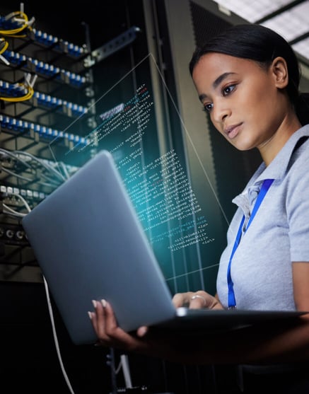 IT worker looking at computer