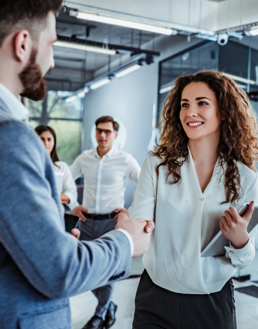 image of person shaking hands with another person