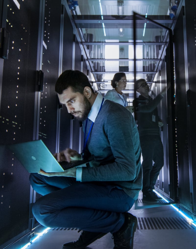 People working in computer data room